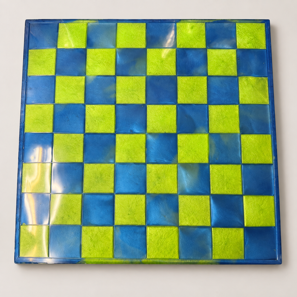 Blue and lime-green resin chess and checkers board