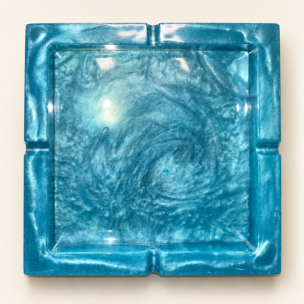 teal pearl swirl large square resin ashtray with four notches on cream background