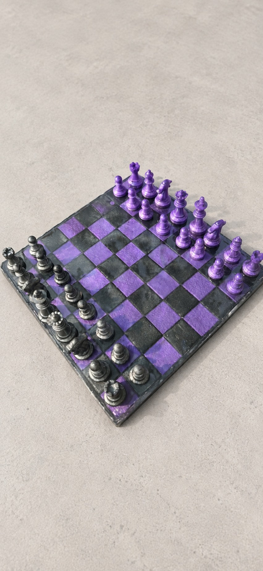 Purple and charcoal handmade resin chessboard with matching chess pieces