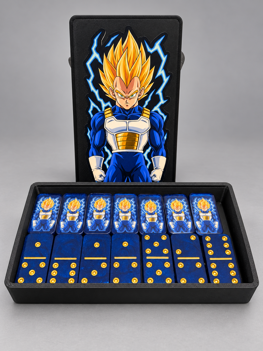 Vegeta blue dominoes with gold dots and included black case